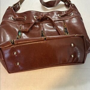 CRYSTALYN KAE SOIRREE BROWN DRAWSTRING TOTE WITH FABRIC INSERTS MADE IN USA